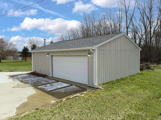 garage with a lawn