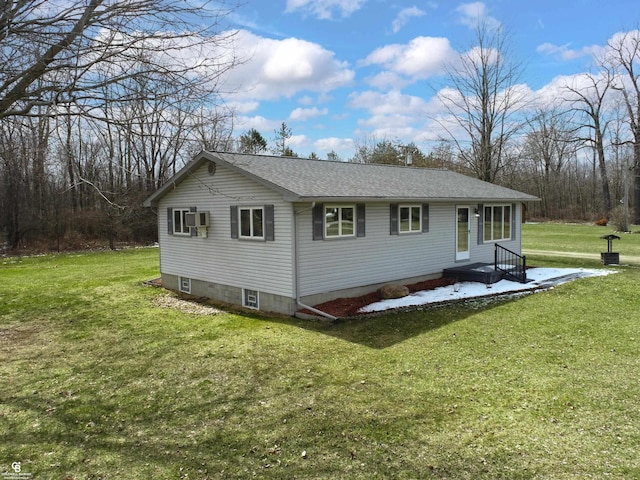 view of home's exterior with a yard