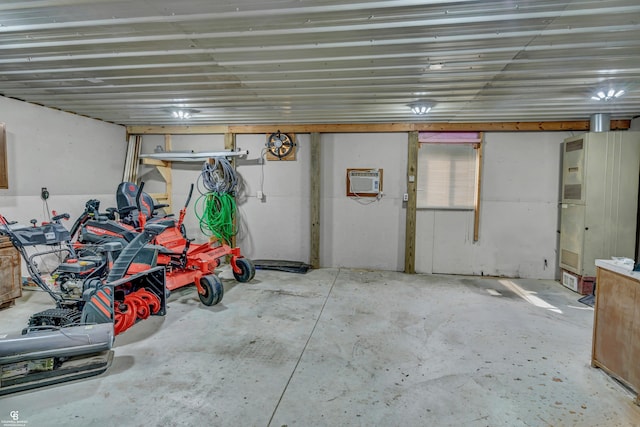 garage featuring a wall unit AC