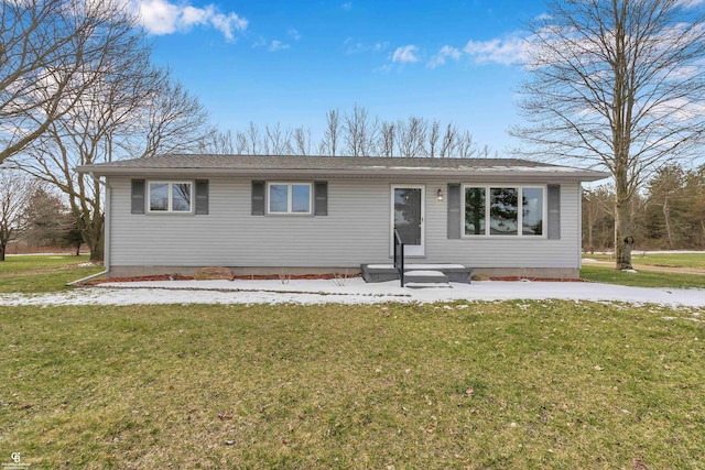 ranch-style home with a front yard