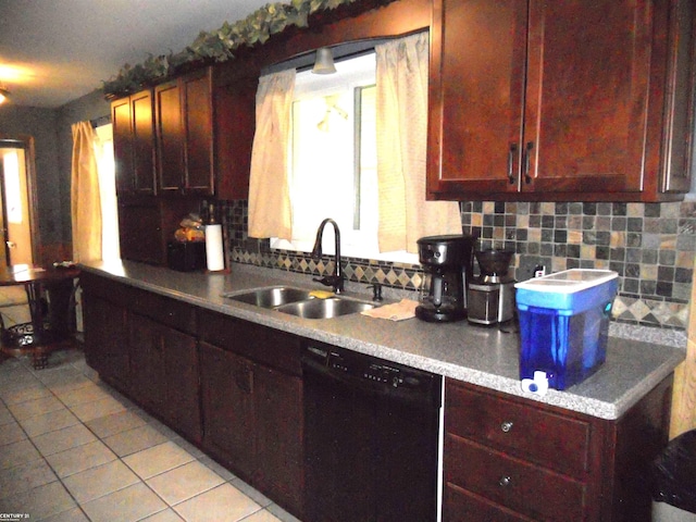 kitchen featuring black dishwasher, light tile patterned floors, tasteful backsplash, and sink