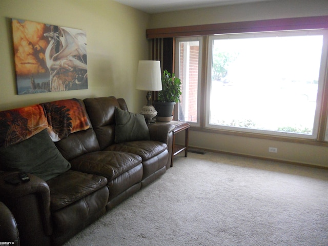 living room with light colored carpet