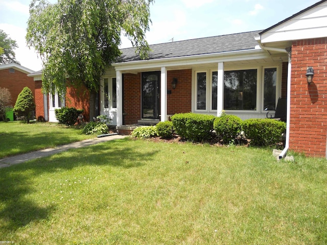 ranch-style home with a front yard