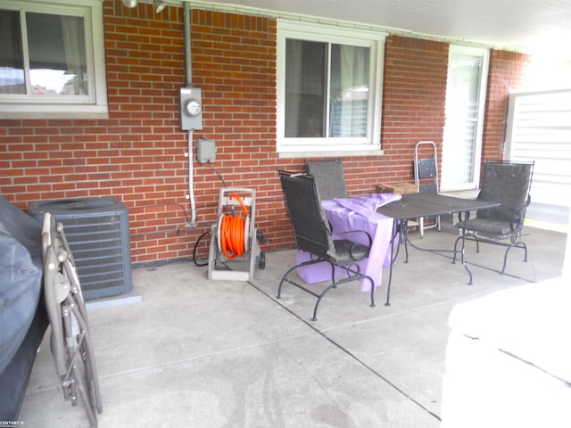 view of patio / terrace with central AC unit