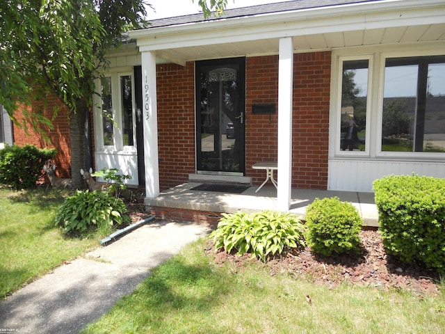 entrance to property with a porch