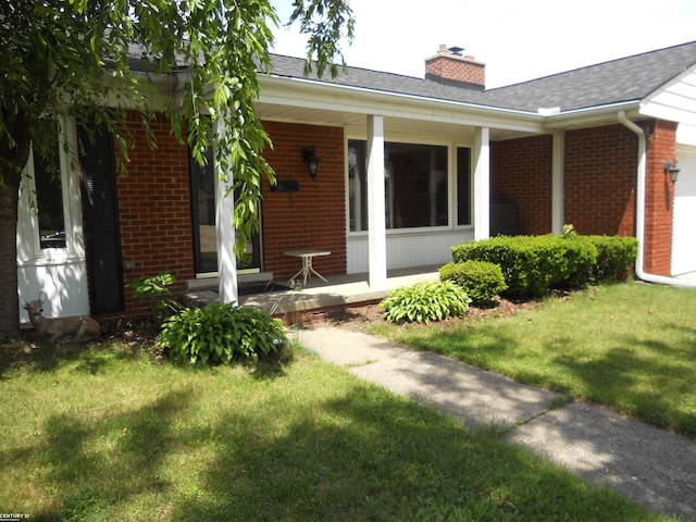 exterior space with a lawn