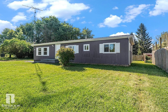 view of front of property with a front lawn