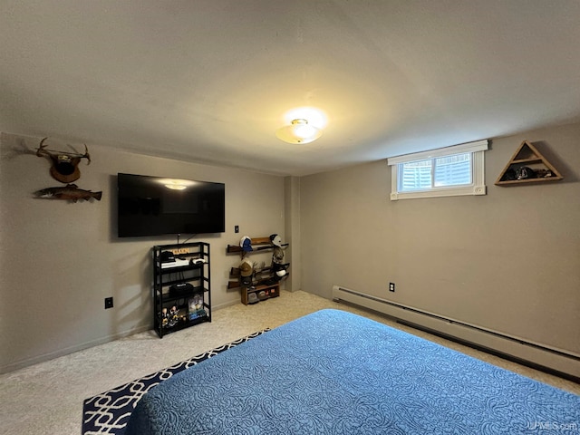 bedroom featuring carpet flooring and baseboard heating