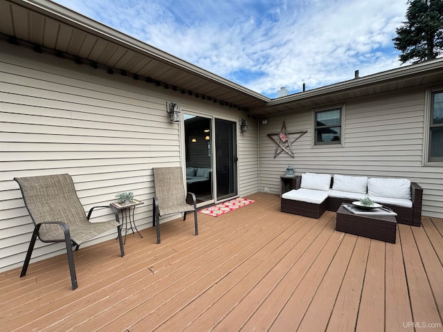 wooden terrace featuring an outdoor living space