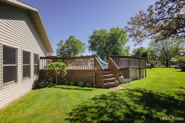 view of yard with a wooden deck