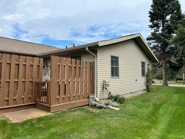 back of house featuring a yard