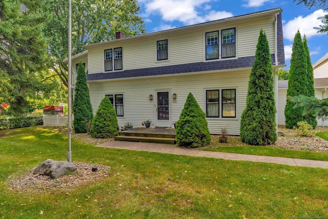 view of front of property with a front lawn