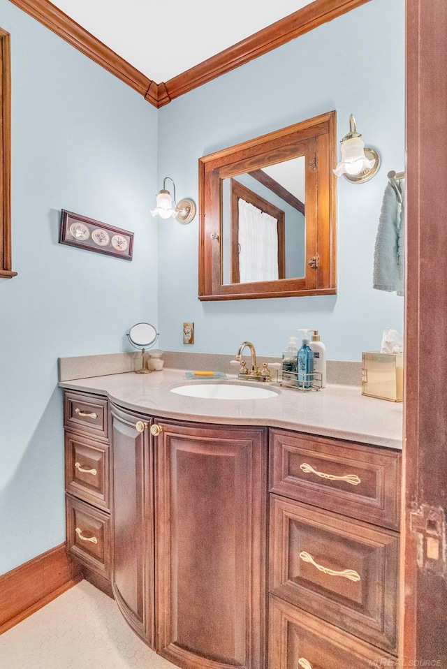 bathroom featuring vanity and crown molding