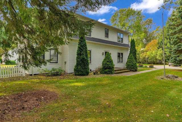 exterior space with a lawn