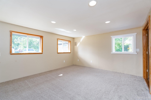 spare room with carpet floors