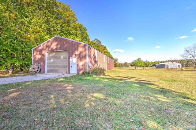 garage with a lawn