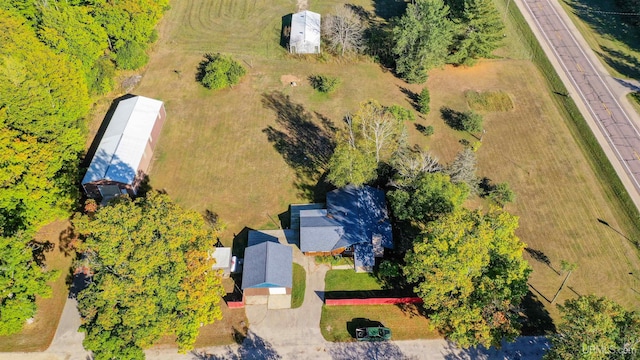 birds eye view of property featuring a rural view