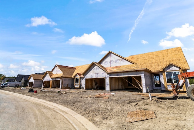 property under construction with an attached garage