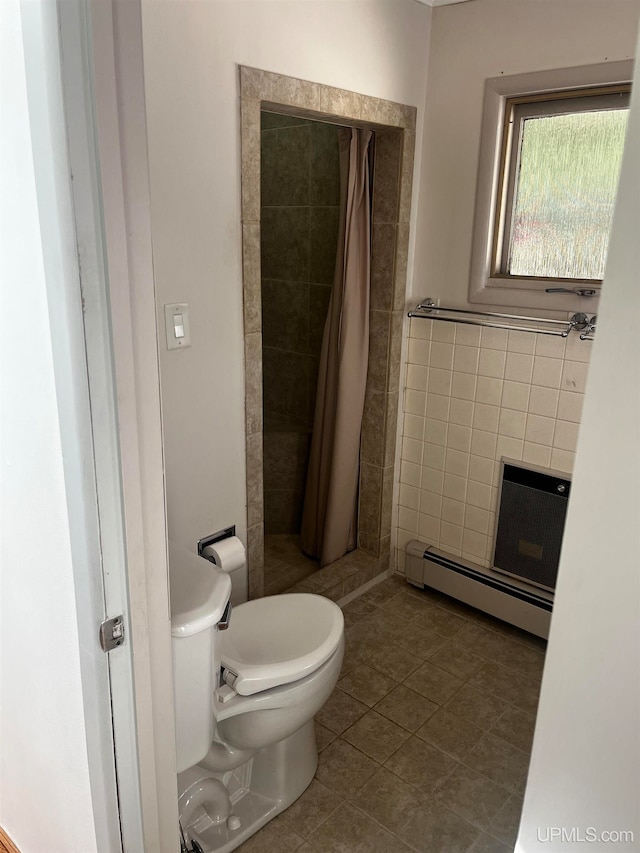 bathroom with a baseboard radiator, a shower with curtain, tile patterned flooring, and toilet