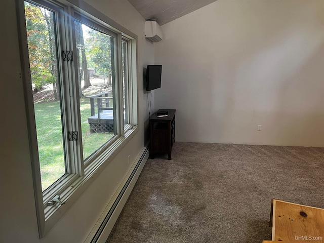 carpeted empty room with a baseboard radiator and an AC wall unit