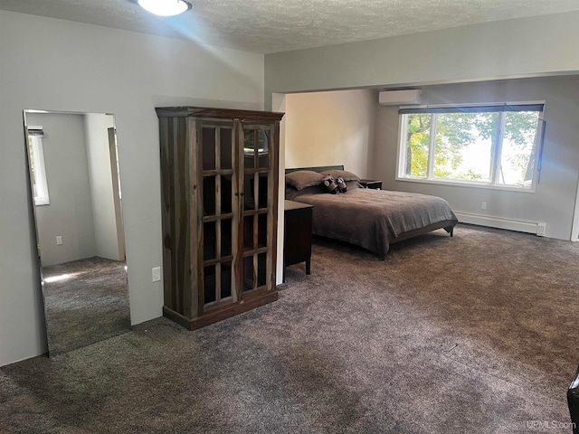 bedroom with a textured ceiling, an AC wall unit, dark colored carpet, and a baseboard heating unit