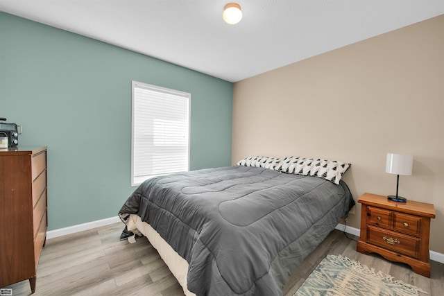 bedroom featuring light wood-type flooring