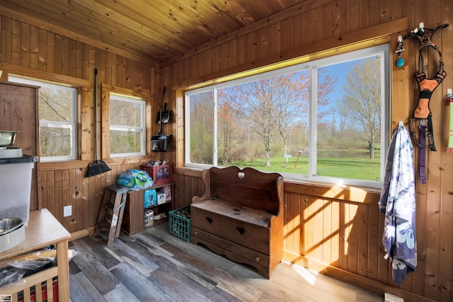 sunroom featuring wood ceiling