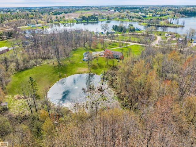 birds eye view of property featuring a water view