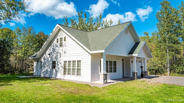 exterior space with a lawn