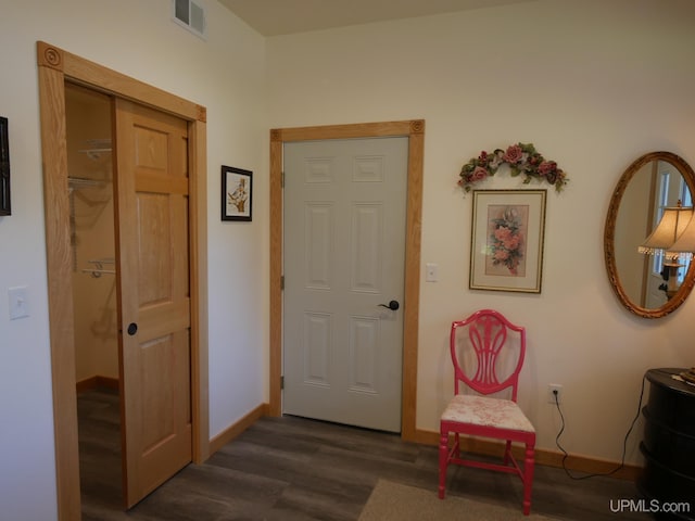 foyer with dark wood-type flooring