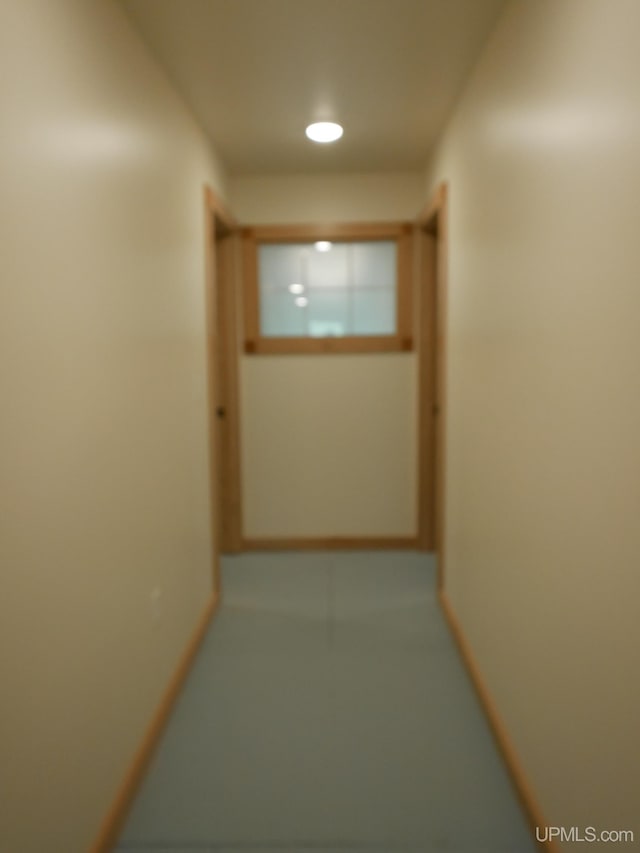 corridor with recessed lighting