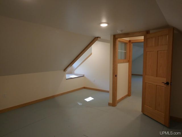 bonus room featuring lofted ceiling