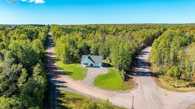 bird's eye view with a forest view