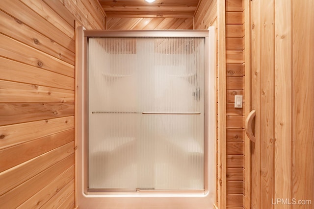 23 Chipman Dr, Ishpeming, MI 49849 - full bath featuring a shower stall and wooden walls