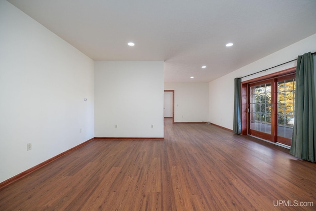 23 Chipman Dr, Ishpeming, MI 49849 - spare room featuring wood finished floors, recessed lighting, and baseboards