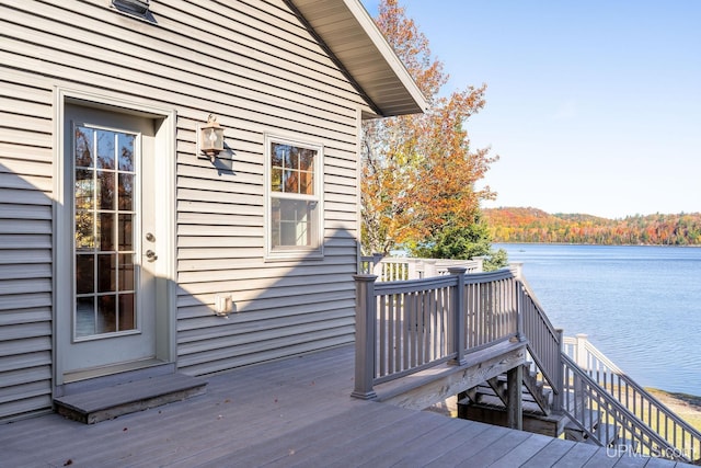 23 Chipman Dr, Ishpeming, MI 49849 - deck with a water view and stairway
