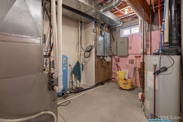 23 Chipman Dr, Ishpeming, MI 49849 - basement featuring gas water heater, electric panel, and a water pressure tank