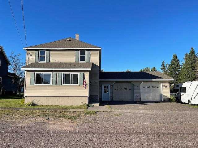 view of front of home with a garage