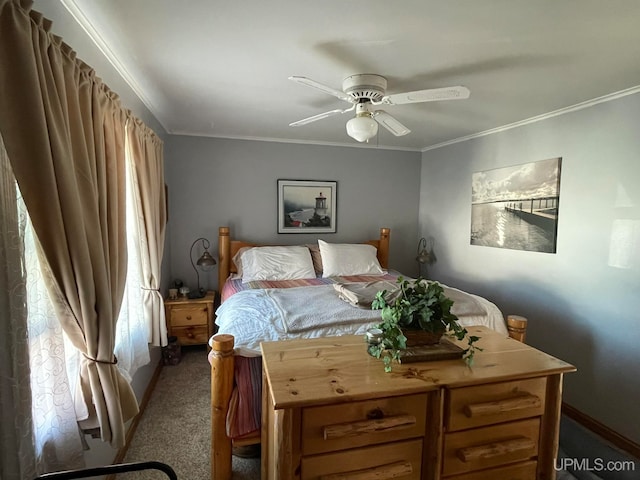 bedroom featuring ornamental molding, ceiling fan, and carpet flooring