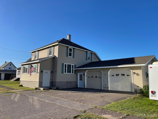 view of front of home featuring a garage