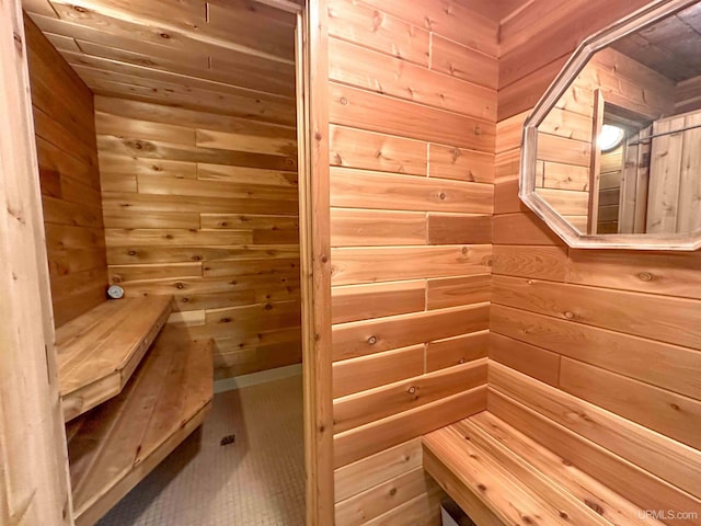 view of sauna / steam room featuring wood walls