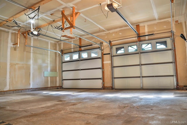 garage featuring a garage door opener