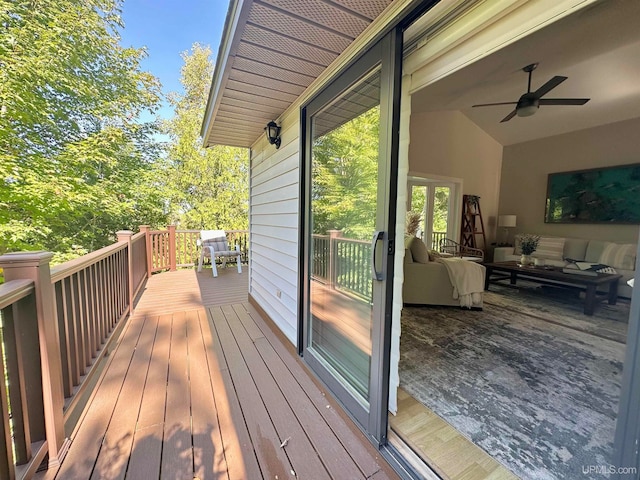 wooden deck with ceiling fan