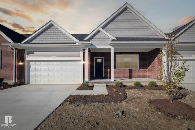 view of front of property with a garage