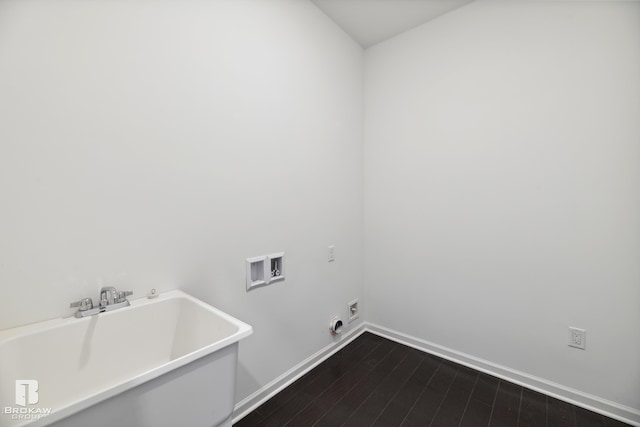 clothes washing area featuring hookup for a washing machine, electric dryer hookup, and dark hardwood / wood-style flooring