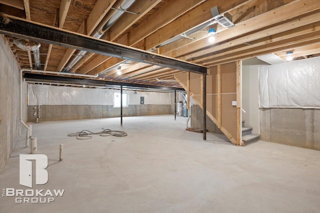 1440 Lincoln St, Lapeer, MI 48446 - basement featuring water heater and stairs