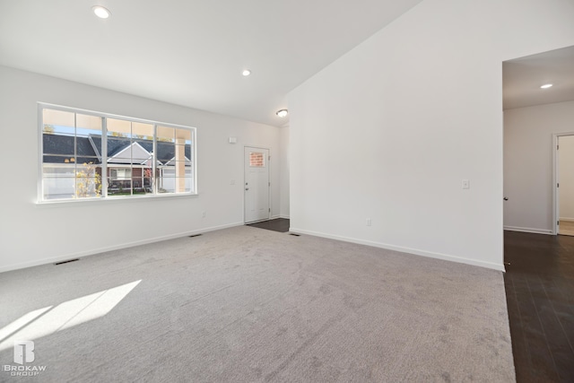 empty room with dark wood-type flooring