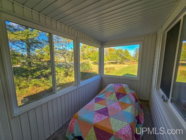 sunroom / solarium featuring a wealth of natural light