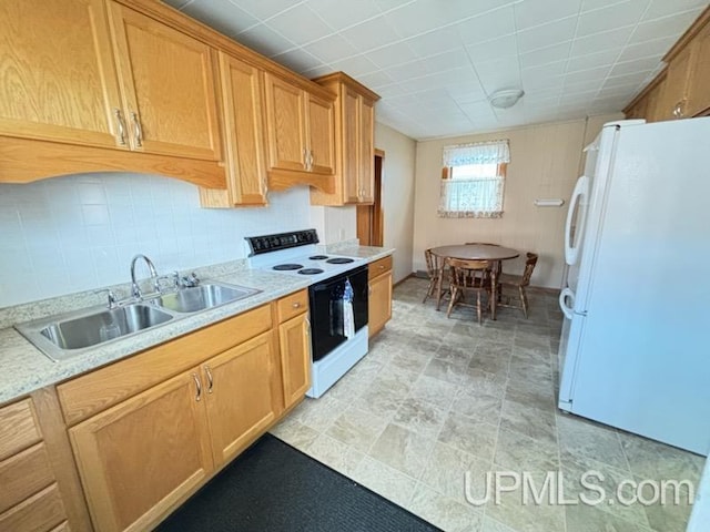 kitchen with white appliances, sink, and decorative backsplash