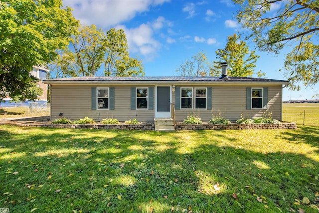 ranch-style house with a front yard